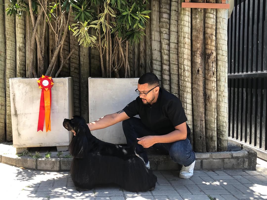 Tarcizo Júnior com o cocker Harvey após competição